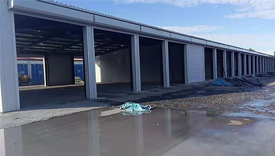 H секция Стальной Prefab складское здание Горяче прокатаемый оцинкованный Экономический промышленный легкий вес Большой протяженность